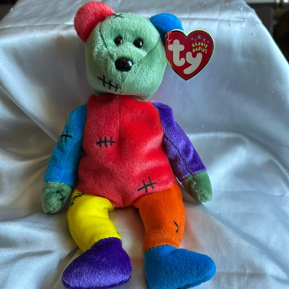 Ty Beanie Baby “FrankenTeddy” 2001. Birthdate: 10-31-2001. Rainbow.
